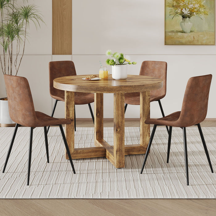A Modern And Practical Circular Dining Table. Made Of MDF Tabletop And Wooden MDF Table Legs. A (Set of 4) Brown Cushioned Chairs In A Modern Medieval Style Restaurant