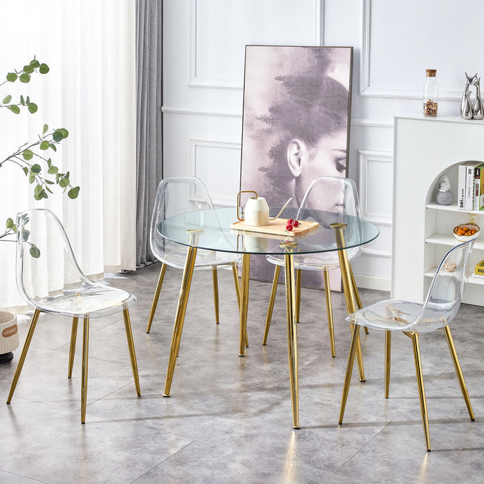 A Glass TableTop With A Diameter Of 40 Inches And A Modern Minimalist Circular Dining Table With Gold Plated Metal Legs.